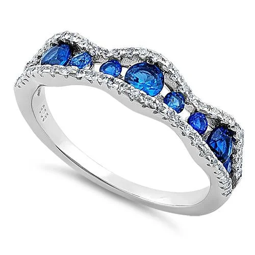 Sterling Silver Cascading Wave Round Cut Clear & Blue Spinel CZ Ring